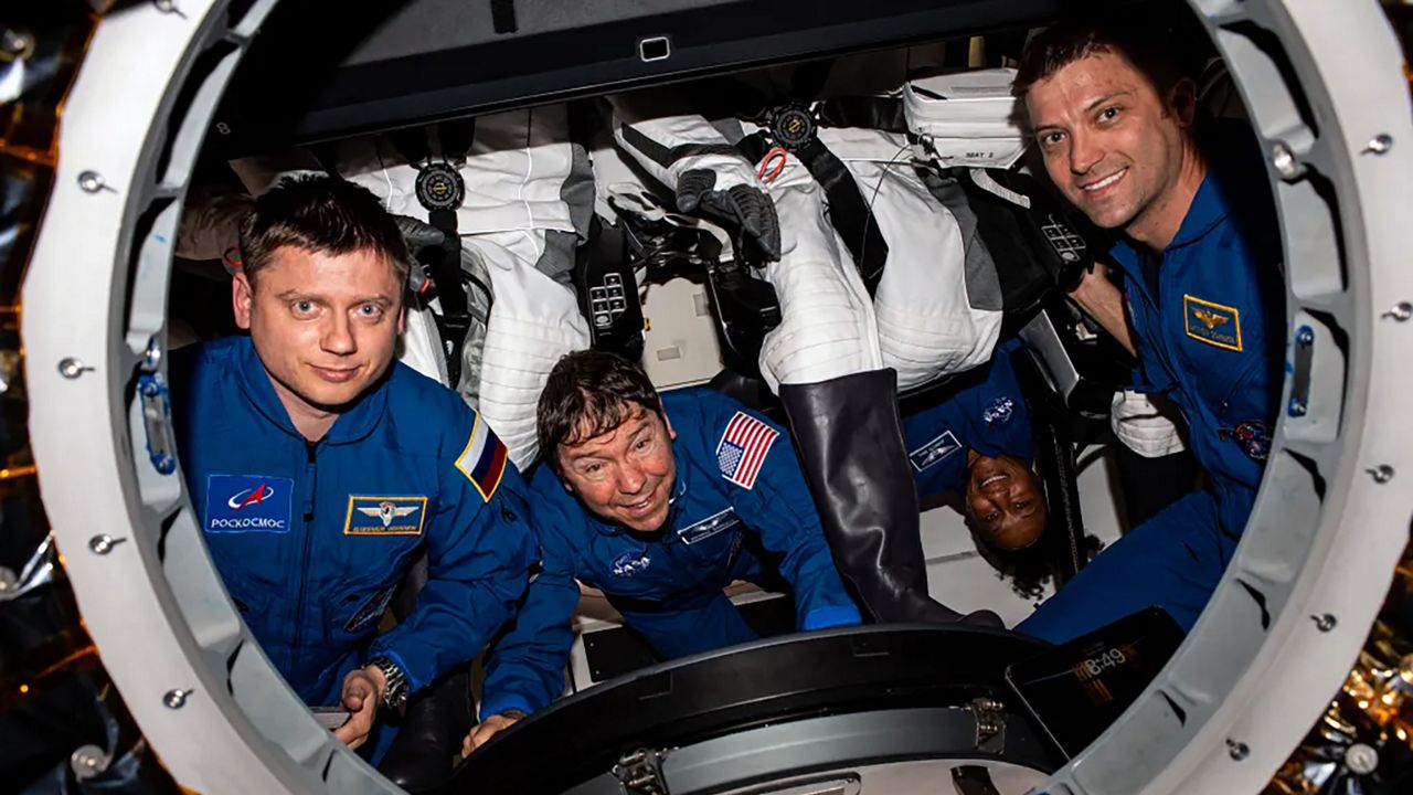 Crew-8 members NASA astronauts Cmdr. Matthew Dominick, pilot Michael Barratt, and mission specialists Jeanette Epps and Roscosmos cosmonaut Alexander Grebenkin take a moment to pose for a photo while inside SpaceX's Dragon space capsule. (NASA)