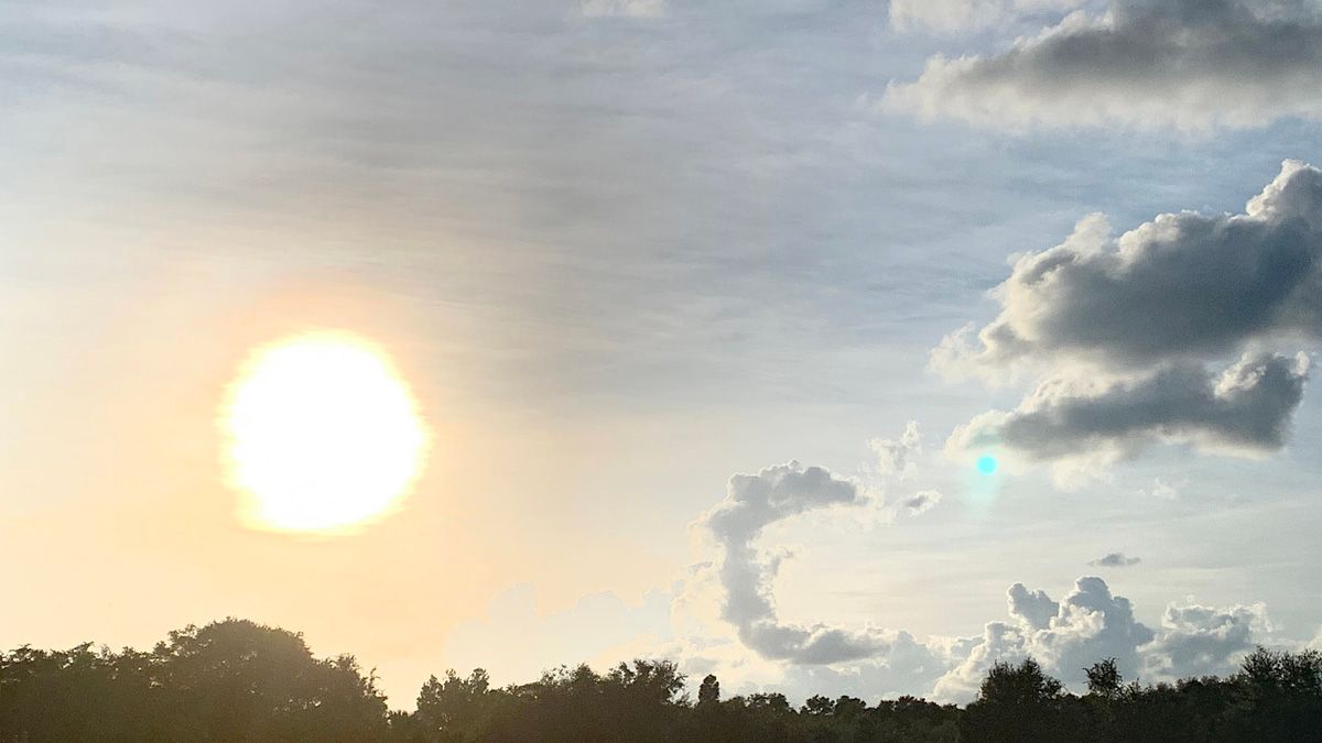 This captivating cloud formation looked like a crescent moon right next to the setting sun over Windermere Elementary School on Tuesday, October 22, 2019. (Anthony Leone/Spectrum News 13)