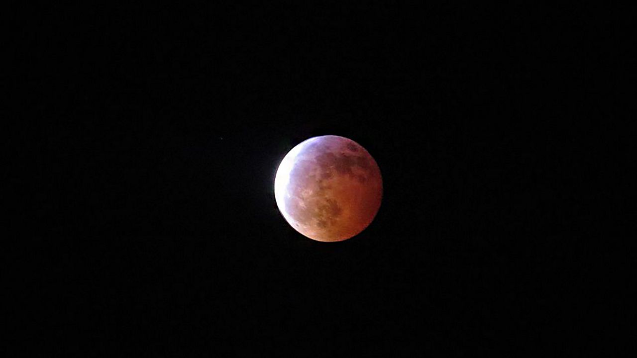 A total lunar eclipse is seen over Orlando, Fla., in 2019. (Spectrum News/Anthony Leone)