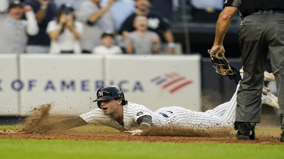 Yankees beat Rays in final at bat to clinch postseason berth