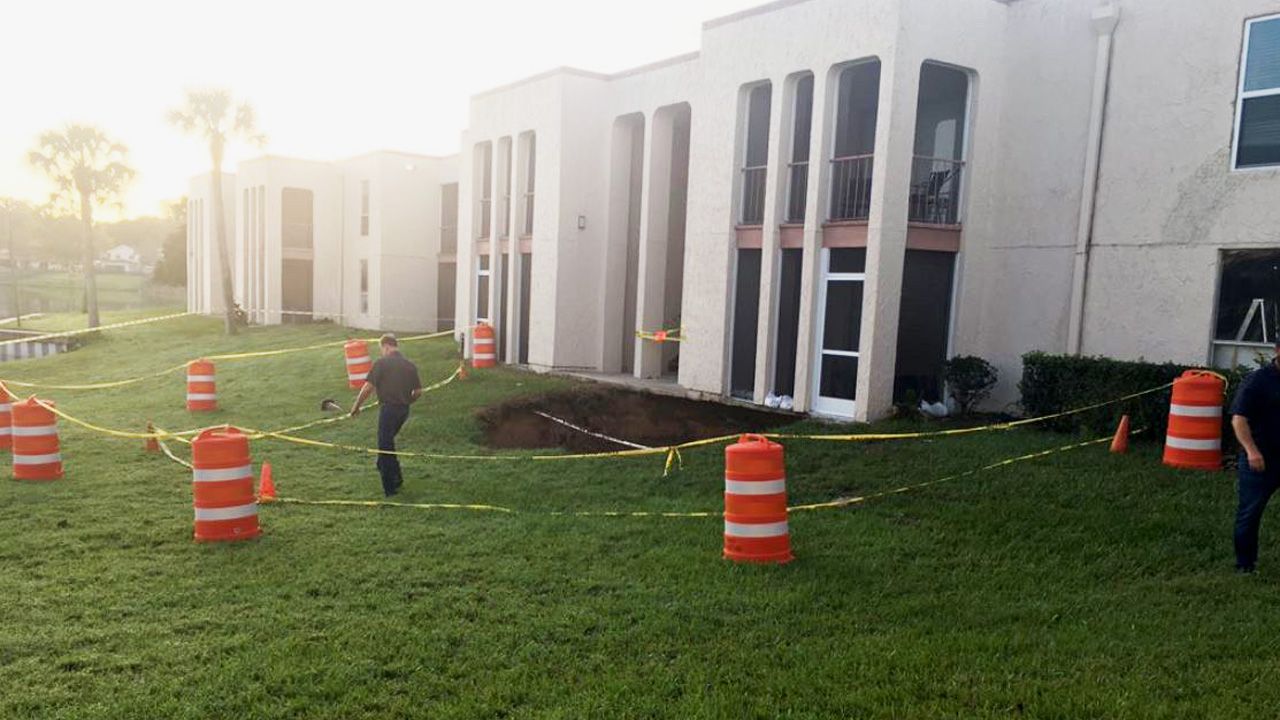 The sinkhole at the Royal Arms Condominiums in Altamonte Springs has since been filled in. Steel piles may have to be placed underneath the building along with some deeper compaction to better stabilize the ground, but that could take some time. (Jerry Hume/Spectrum News 13)