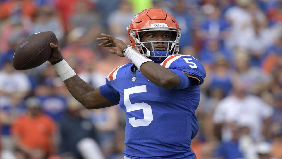 Florida quarterback Emory Jones (5) throws a pass during the first half of the Gators' 42-0 win over Vanderbilt.  Jones finished the day with 273 pass yards and a career-high four TD passes. (AP Photo/Phelan M. Ebenhack)