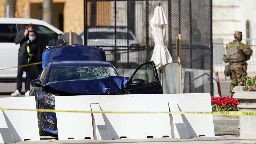 The car that crashed into a barrier on Capitol Hill is seen near the Senate side of the U.S. Capitol in Washington, Friday, April 2, 2021. (AP Photo/Carolyn Kaster)