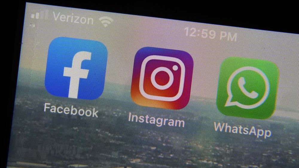 This photo shows the mobile phone app logos for, from left, Facebook, Instagram and WhatsApp in New York, Tuesday, Oct. 5, 2021. (AP Photo/Richard Drew)