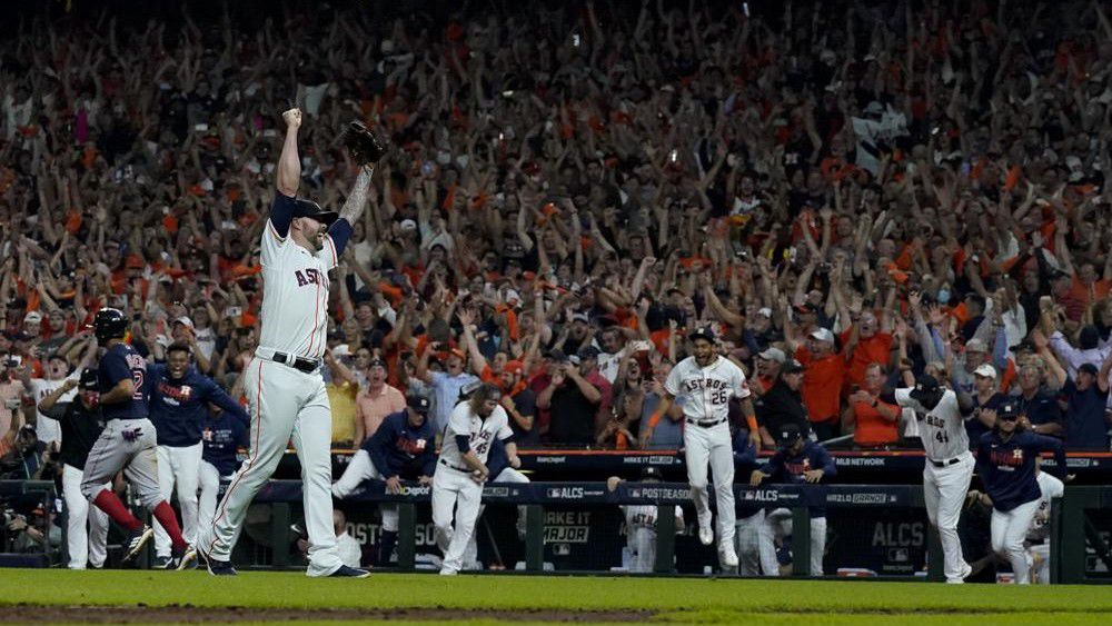 Houston Astros pitcher Ryan Pressly celebrates their win against the Boston Red Sox in Game 6 of baseball's American League Championship Series Friday, Oct. 22, 2021, in Houston. The Astros won 5-0, to win the ALCS series in game six. (AP Photo/David J. Phillip)