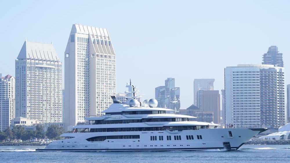 xThe super yacht Amadea passes San Diego as it comes into the San Diego Bay Monday, June 27, 2022, seen from Coronado, Calif. The $325 million superyacht seized by the United States from a sanctioned Russian oligarch arrived in San Diego Bay on Monday. (AP Photo/Gregory Bull)