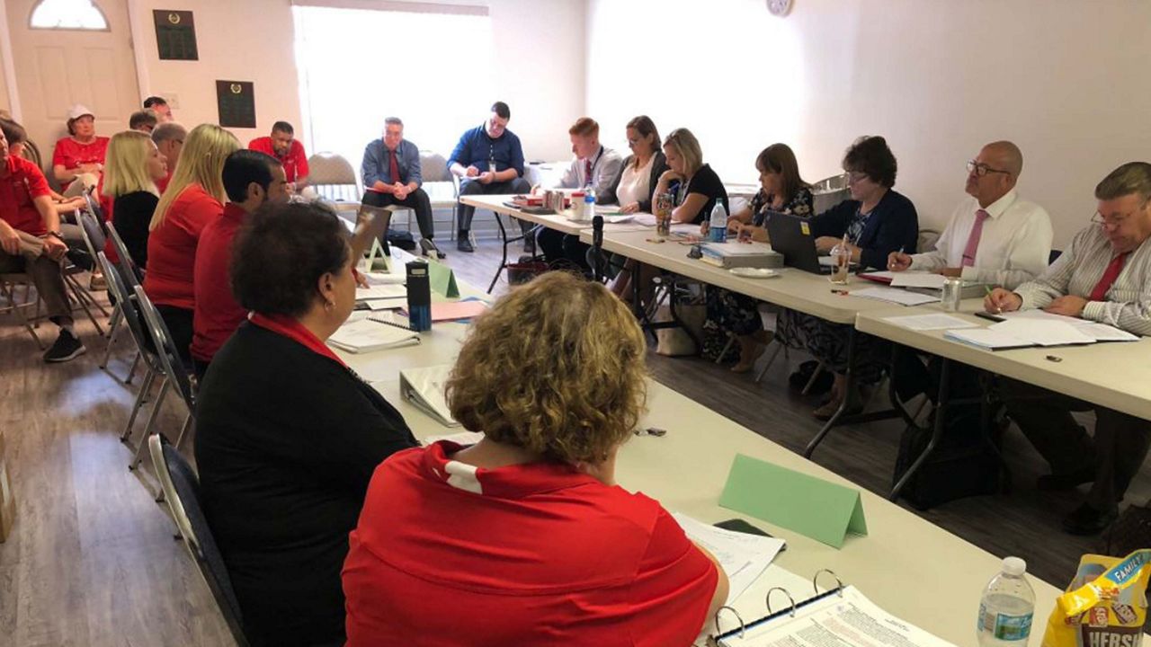 Brevard Federation of Teachers and Brevard County Public Schools at the negotiating table Monday, October 1, 2019. (Eric Mock/Spectrum News 13)
