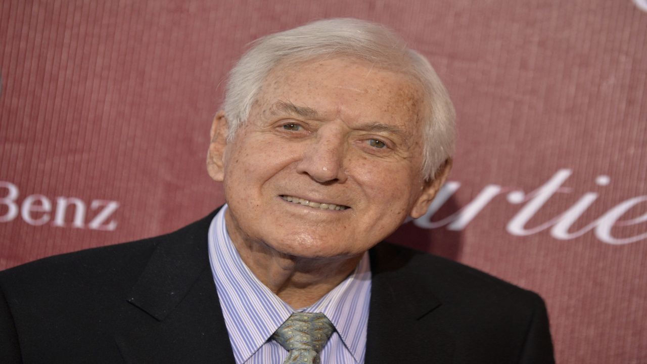 FILE - In this Jan. 4, 2014 file photo, Monty Hall arrives at the Palm Springs International Film Festival Awards Gala at the Palm Springs Convention Center in Palm Springs, Calif. Former "Let's Make a Deal" host Hall has died after a long illness at age 96. His daughter Sharon Hall says he died Saturday, Sept. 30, 2017, at his home in Beverly Hills, Calif. (Photo by Jordan Strauss/Invision/AP, File)