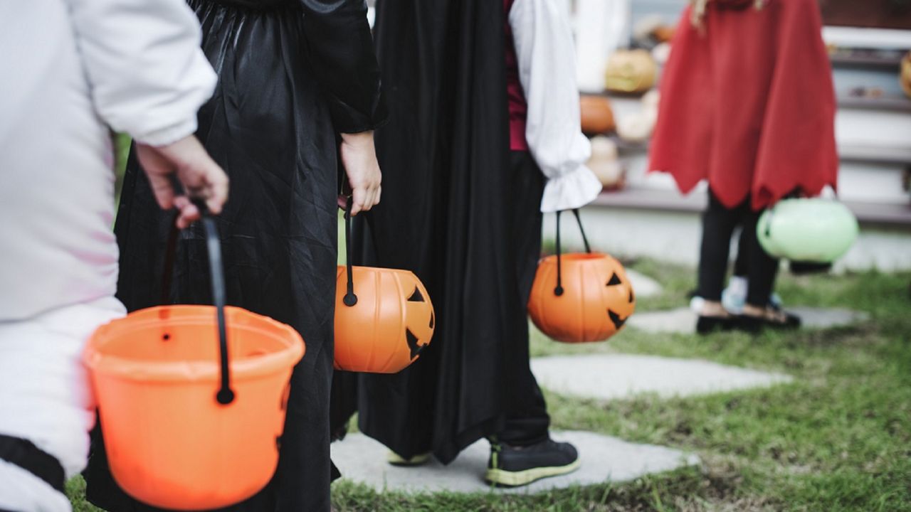 Generic image of children holding candy baskets for Halloween trick-or-treating (Spectrum News/File)