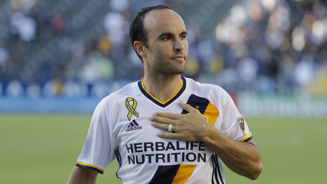 Los Angeles Galaxy's Landon Donovan acknowledges fans after the team's MLS soccer match against Orlando City in Carson, Calif. on (AP Photo/Jae C. Hong)