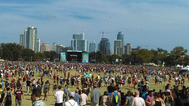 FILE- Crowd faces stage with Austin skyline as the backdrop at the 2017 ACL Fest.