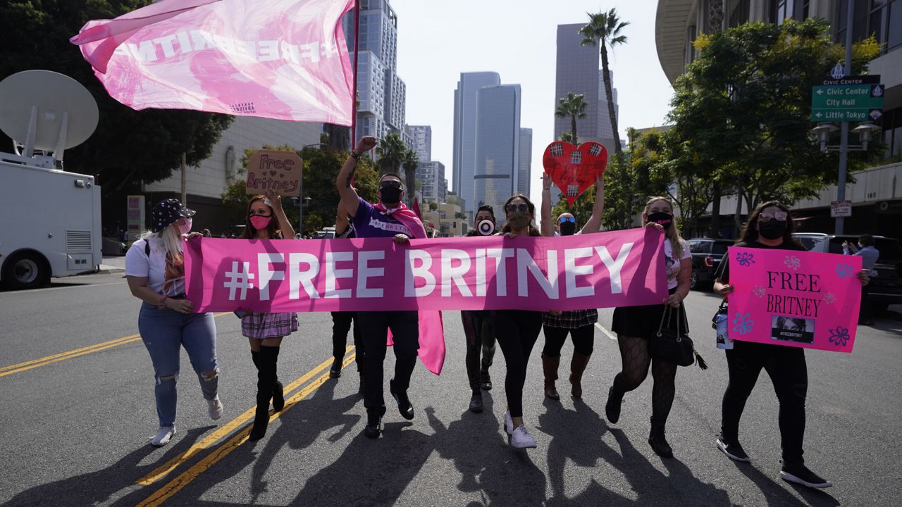 Britney Spears supporters demonstrate outside the Stanley Mosk Courthouse, Wednesday, Sept. 29, 2021, in Los Angeles. (AP Photo/Chris Pizzello)