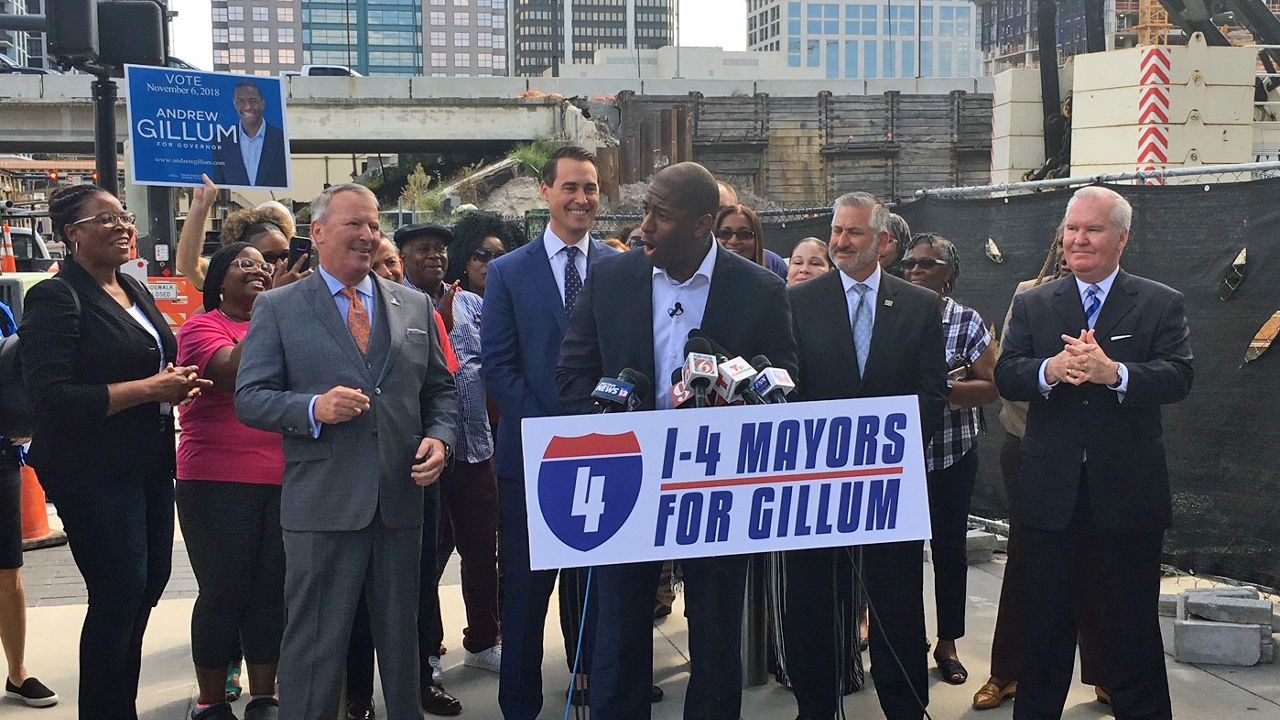 Mayors Buddy Dyer (Orlando), Bob Buckhorn (Tampa), and Rick Kriseman (St. Petersburg) gathered Thursday morning in downtown Orlando to announce they're endoring Andrew Gillum for Florida governor. (Greg Angel, staff)