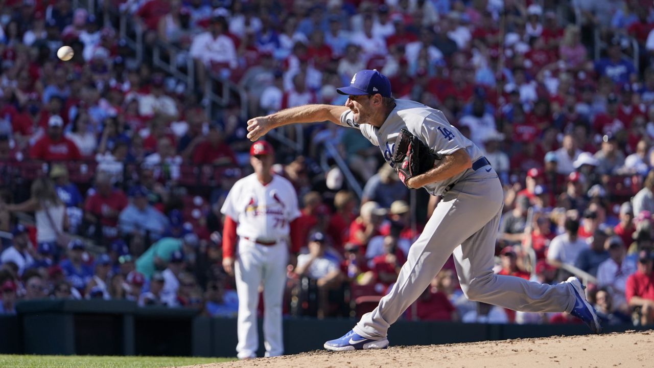 Los Angeles Dodgers starting pitcher Max Scherzer throws during the fourth inning of a baseball game against the St. Louis Cardinals Monday, Sept. 6, 2021, in St. Louis. (AP Photo/Jeff Roberson)