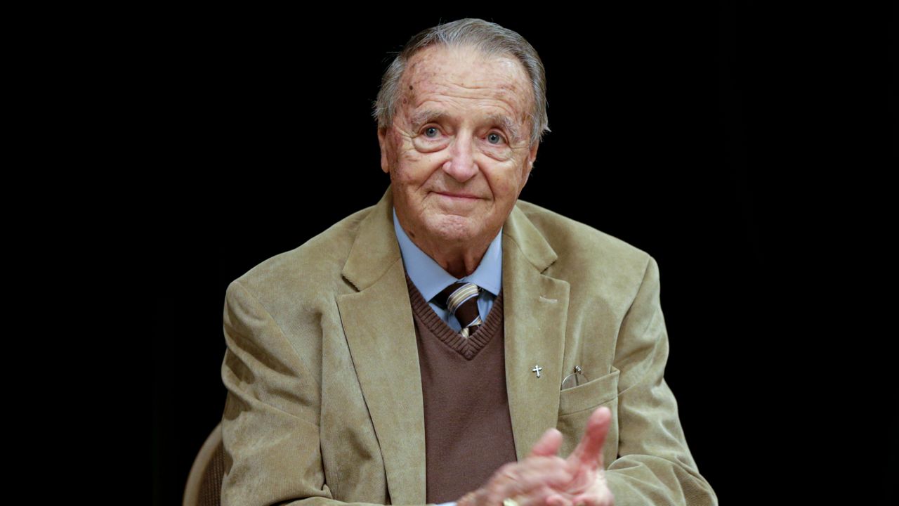 In this file photo from January 10, 2018, retired FSU Coach Bobby Bowden applauds following a Rotary Club luncheon in Omaha, Nebraska. He was in Omaha to accept the Tom Osborne Legacy Award as part of the Outland Trophy banquet. (Nati Harnik/AP)