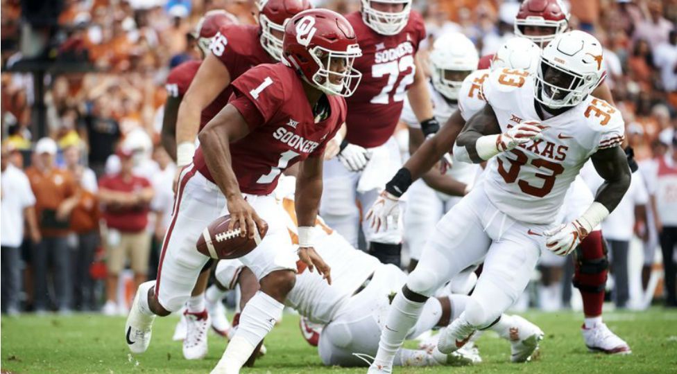 FILE - In this Oct. 6, 2018, file photo, Oklahoma quarterback Kyler Murray (1) scrambles against Texas during the first half of an NCAA college football game at the Cotton Bowl in Dallas. The Sooners face Texas in the Big 12 championship game on Saturday. (AP Photo/Cooper Neill, FIle)