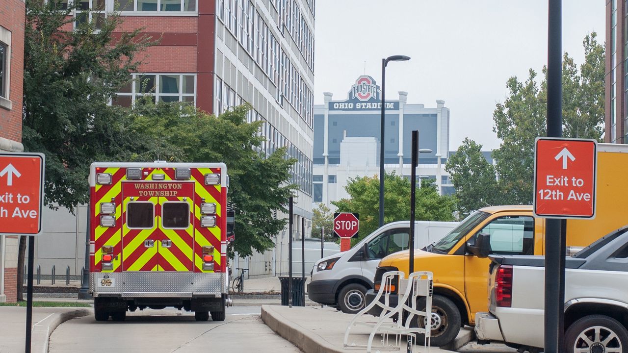 An ambulance parked outside a building.