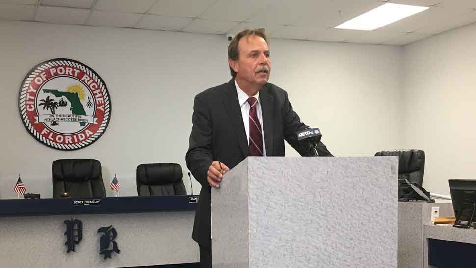 Port Richey City Attorney Jack Matthieu speaks to assembled media regarding the city's fight against an effort to dissolve the city led by state representative Amber Mariano and state senator Ed Hooper. (Sarah Blazonis/Spectrum Bay News 9)
