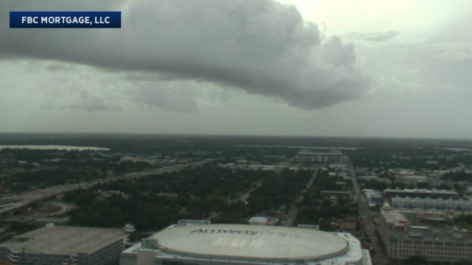 A line of storm clouds passes over downtown Orlando on Monday afternoon as Hurricane Michael approaches the Gulf of Mexico. (Sky 13 camera)