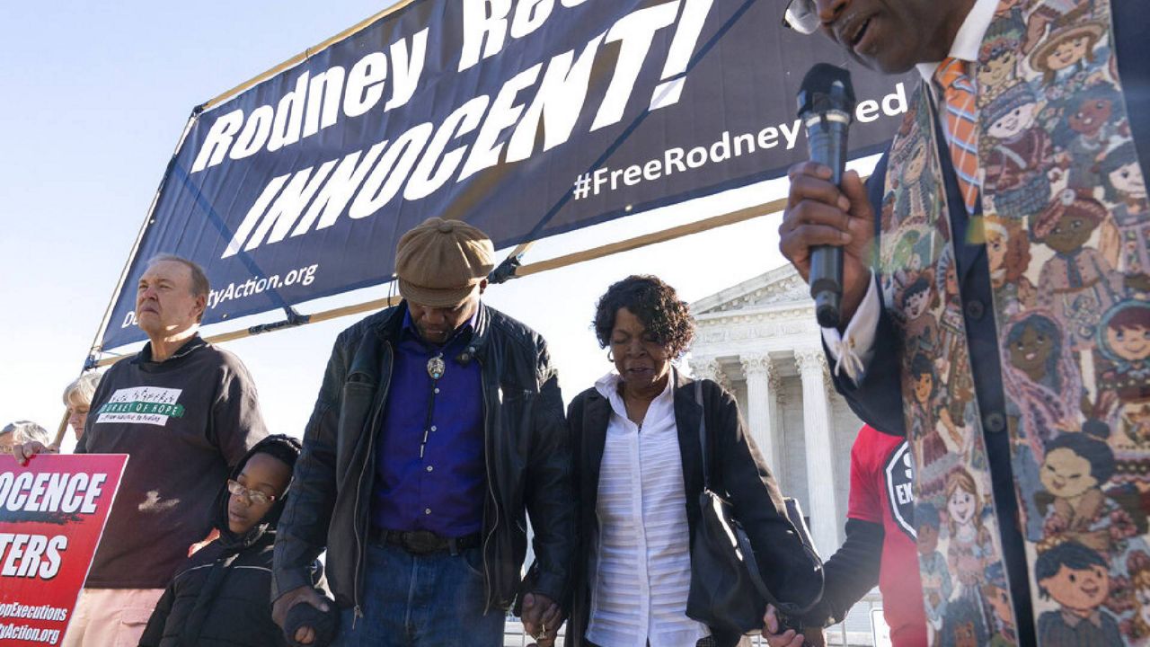 Supreme Court Image ID : 22284531904336 Texas death row prisoner Rodney Reed's mother, Sandra Reed, second from right, brother Roderick Reed, center, and other family members join faith leaders and supporters for a prayer rally organized by Death Penalty Action, in front of the U.S. Supreme Court prior to attending arguments in Rodney Reed v. Bryan Goertz case Tuesday, Oct. 11, 2022, in Washington. (AP Photo/Alex Brandon)