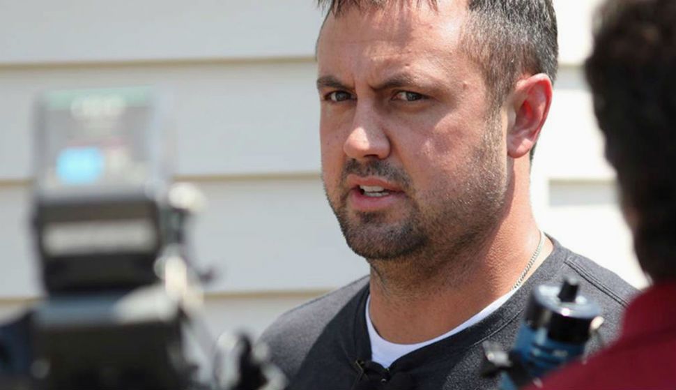In this Monday, July 24, 2017, photo, Brian Pyle, owner of Pyle Transportation Inc., the Iowa trucking company linked to the deadly case of immigrant smuggling in Texas, speaks to reporters in Schaller, Iowa. The company had long promoted itself as an American success: a family firm whose hard-working drivers helped keep the nation's economy running. Pyle has denied any knowledge of human smuggling. (Jared Strong/Carroll Daily Times Herald via AP) 