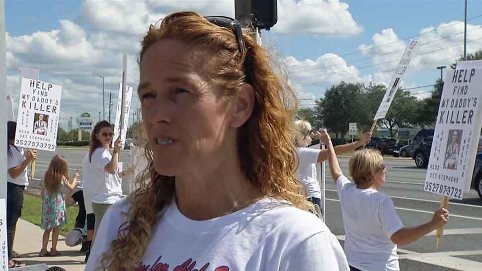 Elizabeth Clark, mother of murder victim Alek Smith, speaks about her son's unsolved murder during a rally to generate awareness about the status of the case, Sunday, Oct. 13, 2019. (Spectrum Bay News 9)