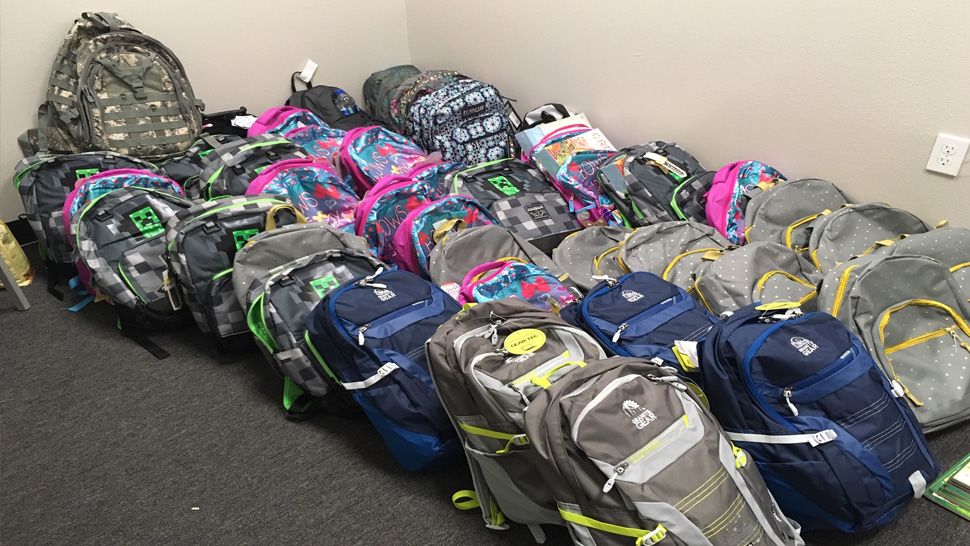 Donated backpacks ready to be sent to the Panhandle. (Tim Wronka/Spectrum News)
