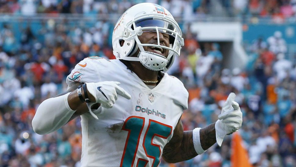 Miami Dolphins wide receiver Albert Wilson (15) celebrates after scoring a touchdown, during the second half of an NFL football game against the Chicago Bears, Sunday, Oct. 14, 2018, in Miami Gardens, Fla. (AP Photo/Joel Auerbach)