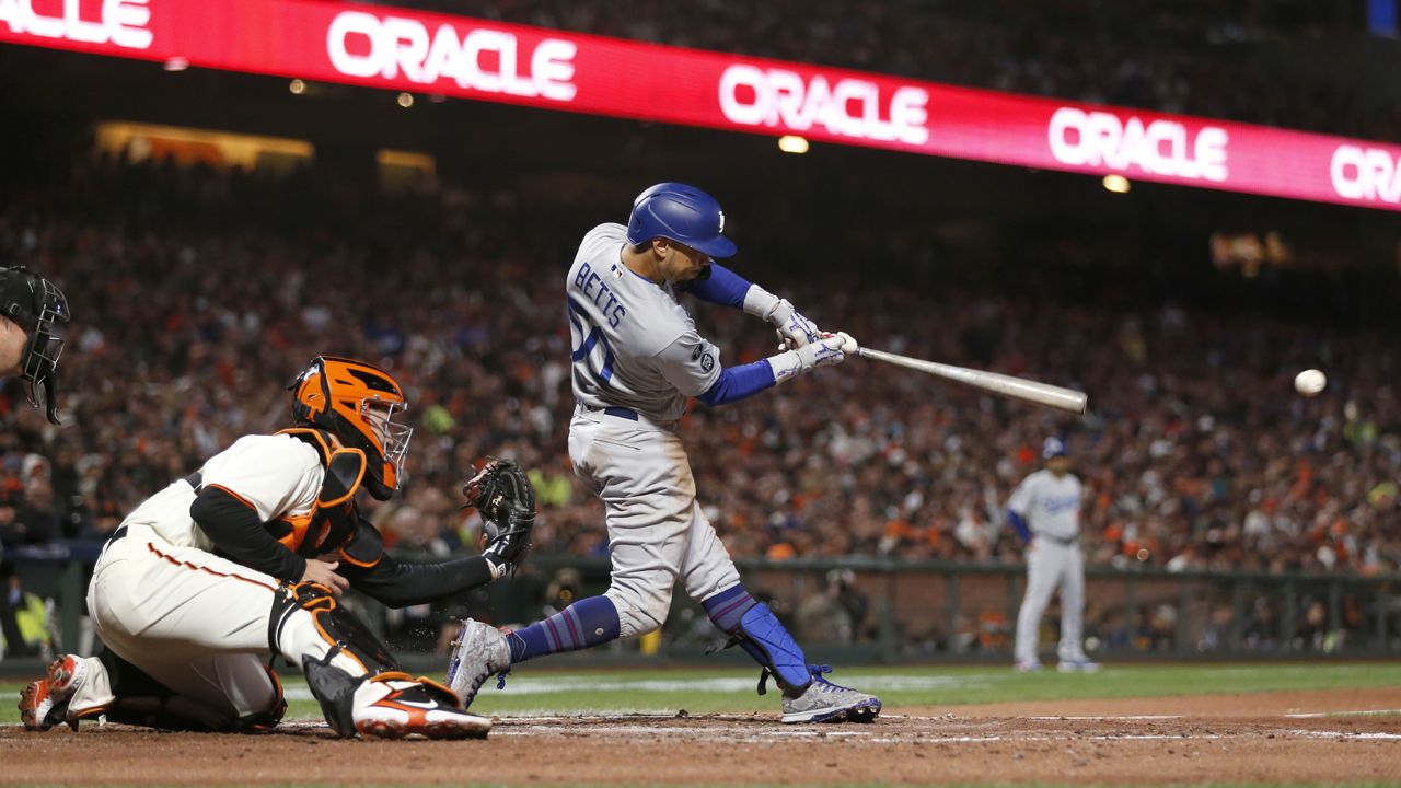 Dodgers defeat Giants to advance to NLCS