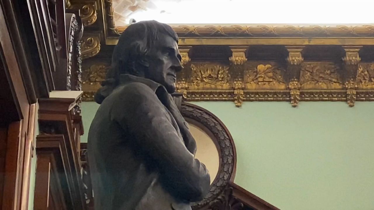 City panel votes to remove statue from council chambers