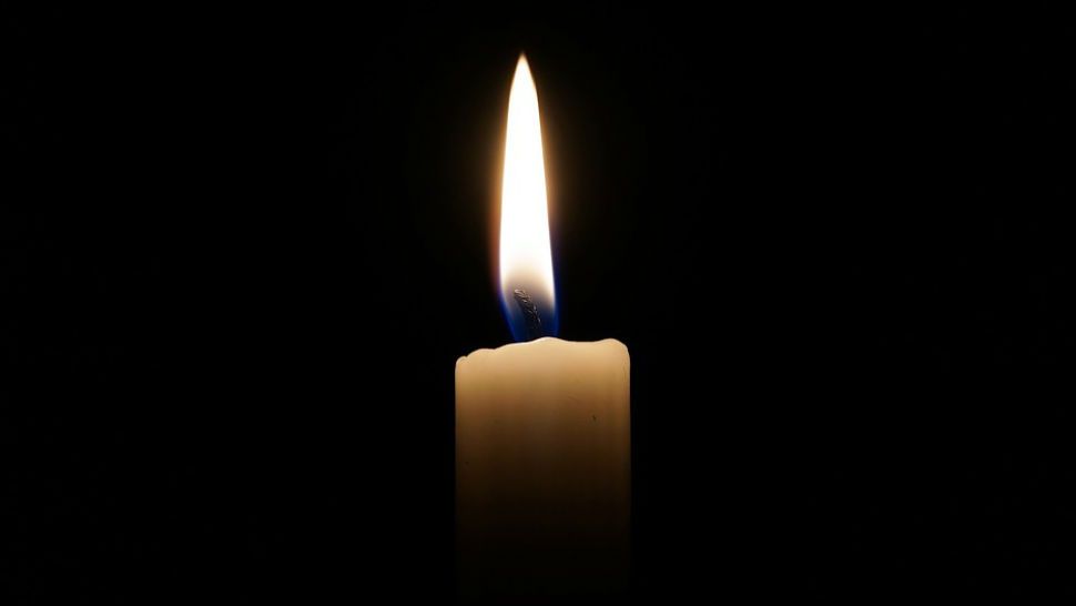 FILE photo of a candle in the dark. (Pixabay)