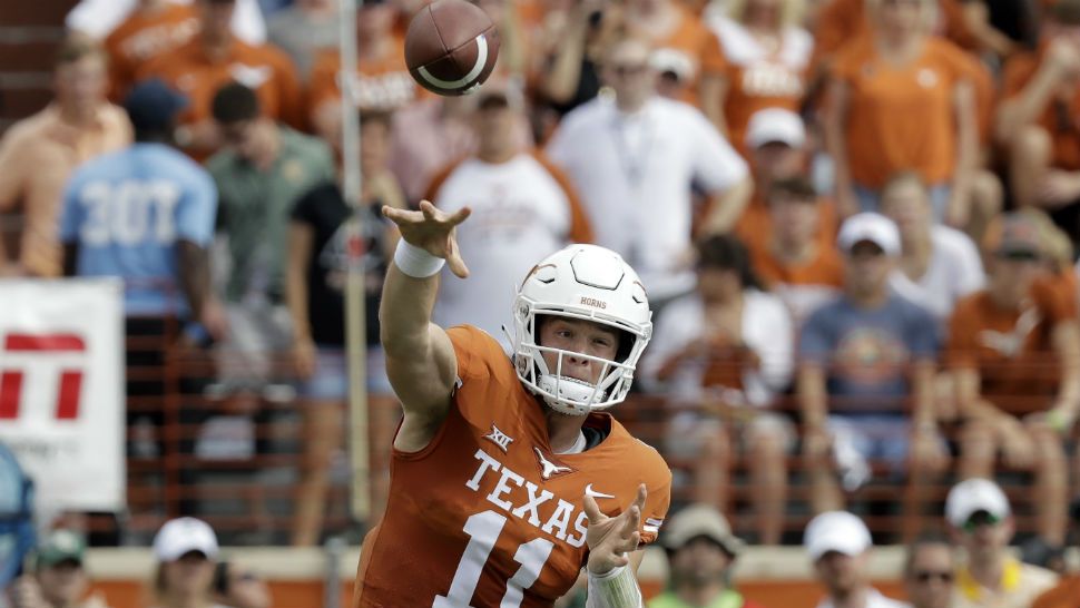Texas quarterback Sam Ehlinger (11) throws against Baylor during the first half of an NCAA college football game, Saturday, Oct. 13, 2018, in Austin, Texas. (AP Photo/Eric Gay)