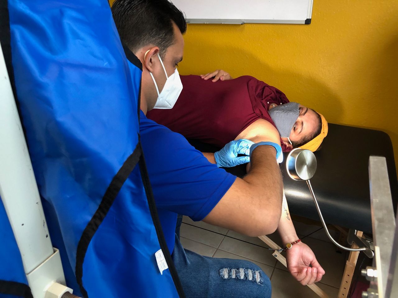 A patient receives care at a nonprofit clinic along the Texas-Mexico border (Spectrum News)