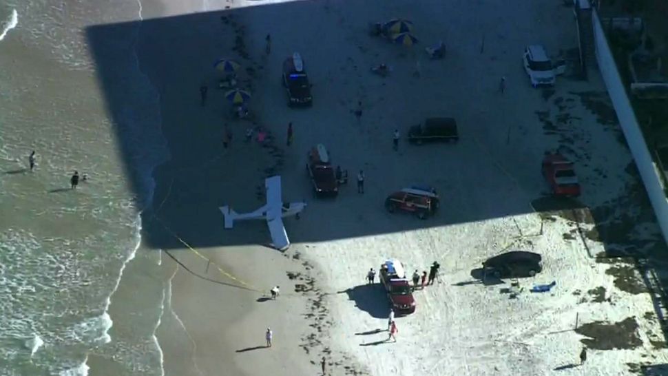 A small plane went down in water off the coast of Daytona Beach Shores on Tuesday afternoon. The pilot was rescued after climbing on a wing, and the plane was hauled onto the beach.