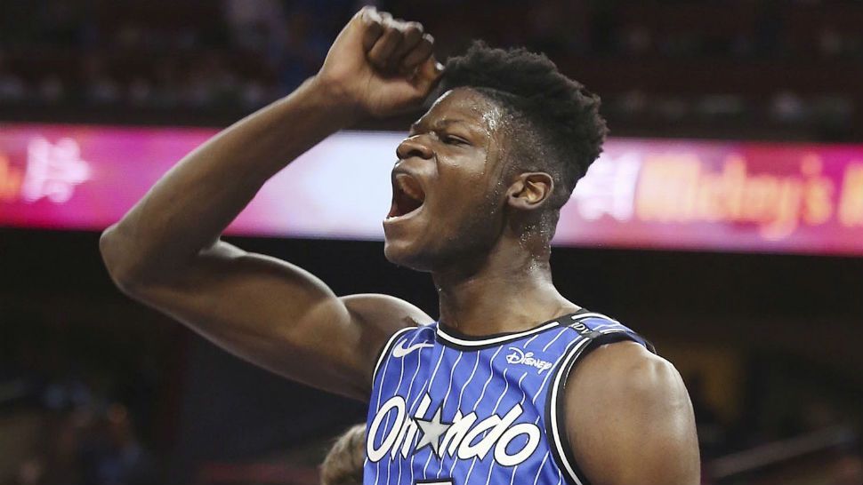 Orlando center Mo Bamba celebrates during an NBA basketball game against the Miami Heat Wednesday, Oct. 17, 2018, in Orlando, Fla. Orlando won the game 104-101. (Stephen M. Dowell/Orlando Sentinel via AP)