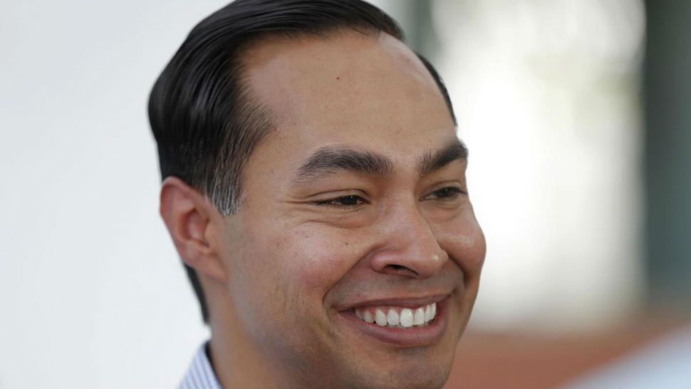 FILE - In this Aug. 17, 2018 file photo, former Housing and Urban Development Secretary Julian Castro speaks to reporters during a visit to the Iowa State Fair in Des Moines, Iowa. (AP Photo/Charlier Neibergall File)