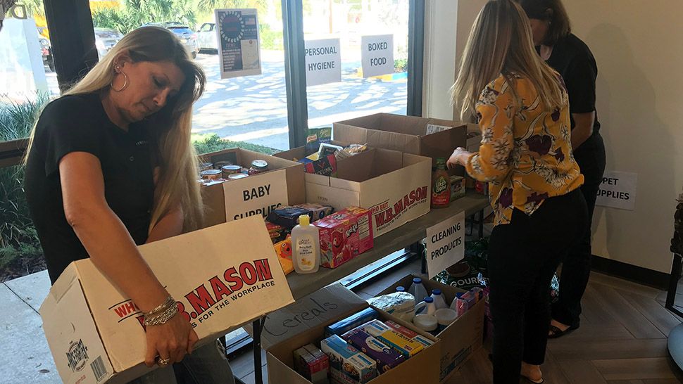 Classic Floors Ferrazzano in Melbourne is collecting donations for people affected by Hurricane Michael. (Greg Pallone/Spectrum News 13)