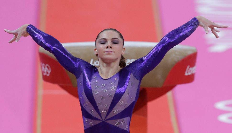 McKayla Maroney performs in the floor exercise event during the final round of the women's Olympic gymnastics trials in San Jose, Calif.