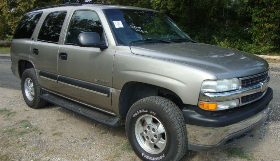 Pictured, Gold 2002 Chevrolet Tahoe