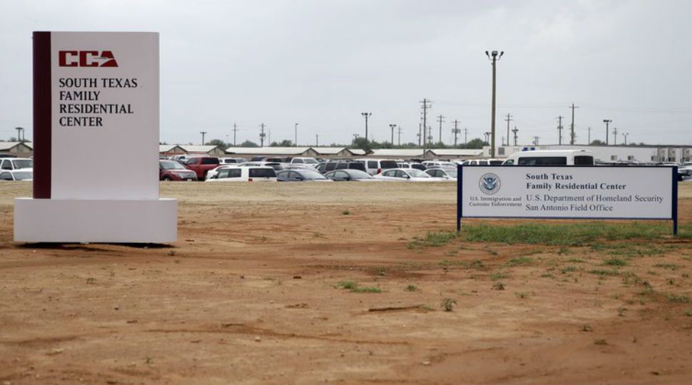 Signs are seen at the entrance to the South Texas Family Residential Center in Dilley, Texas on June 30, 2015 (AP Photo/Eric Gay)