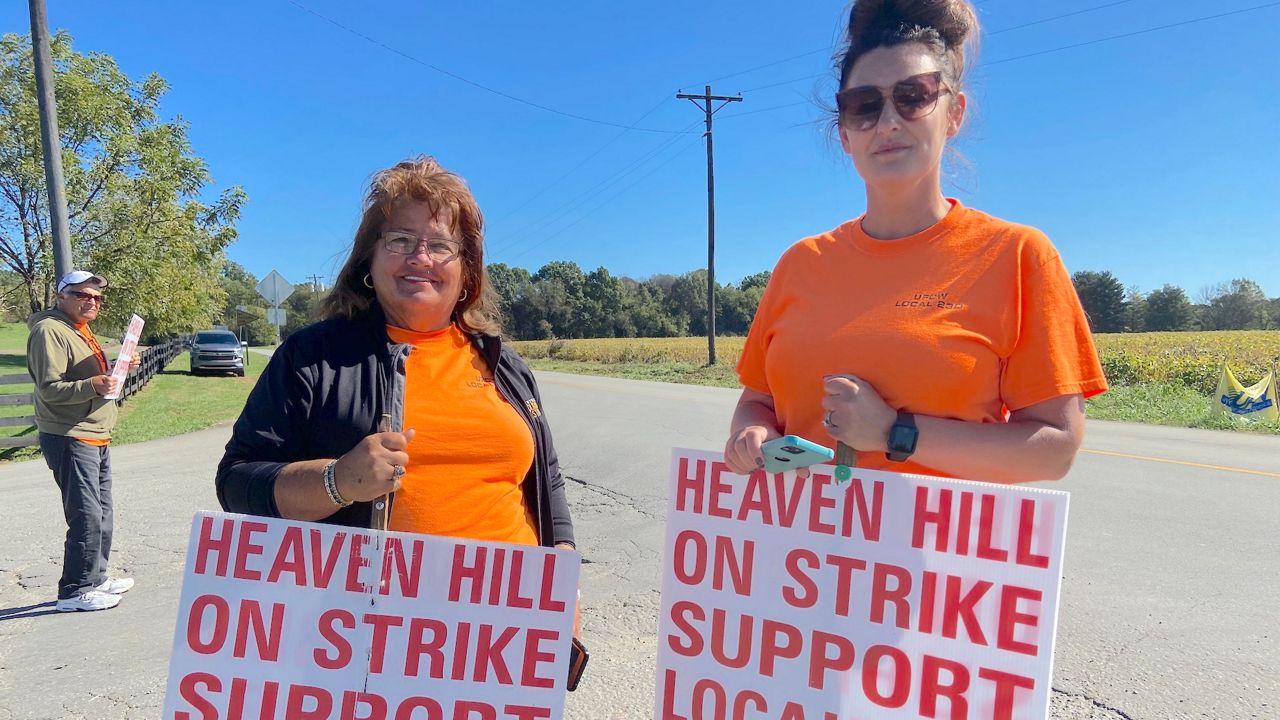 Betty Jo Boone (left) and Katie Gaffney (right) are on strike at Heaven Hill Distillery. (Spectrum News 1 KY/Adam K. Raymond)