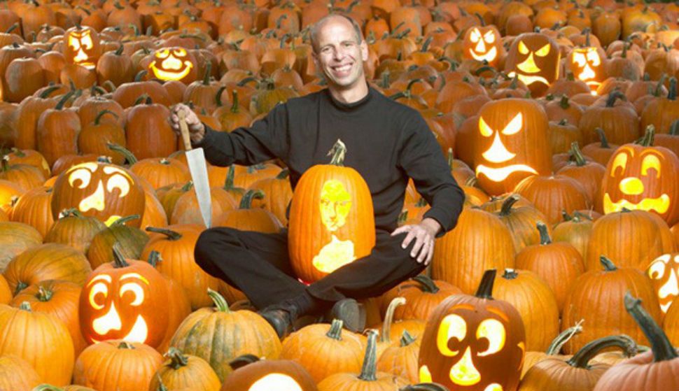 Stephen Clarke is the Guinness World Record holder for the fastest time to carve a tonne (1,000 kg) of pumpkins — 3 hours, 33 minutes, 49 seconds — on Oct. 29, 2008 in Atlantic City, New Jersey. (PHOTO/Guinness World Records)