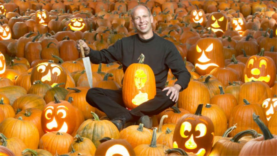 Stephen Clarke is the Guinness World Record holder for the fastest time to carve a tonne (1,000 kg) of pumpkins — 3 hours, 33 minutes, 49 seconds — on Oct. 29, 2008 in Atlantic City, New Jersey. (PHOTO/Guinness World Records)