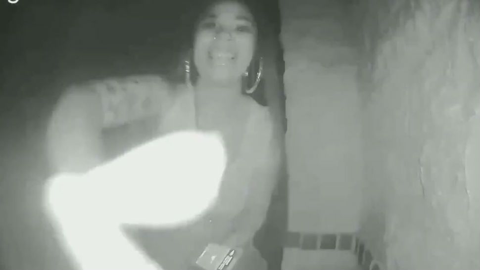 Screen shot of the woman ringing a doorbell in Spring, Texas before leaving a 2-year-old child at the door. (Courtesy: Montgomery County Sheriff's Office)