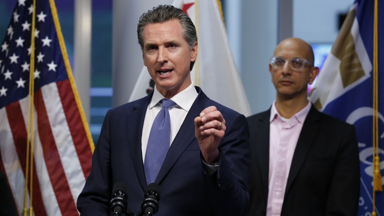 California Gov. Gavin Newsom give an update to the state's response to the coronavirus, at the Governor's Office of Emergency Services in Rancho Cordova Calif., Tuesday, March 17, 2020. (AP Photo/Rich Pedroncelli, Pool)