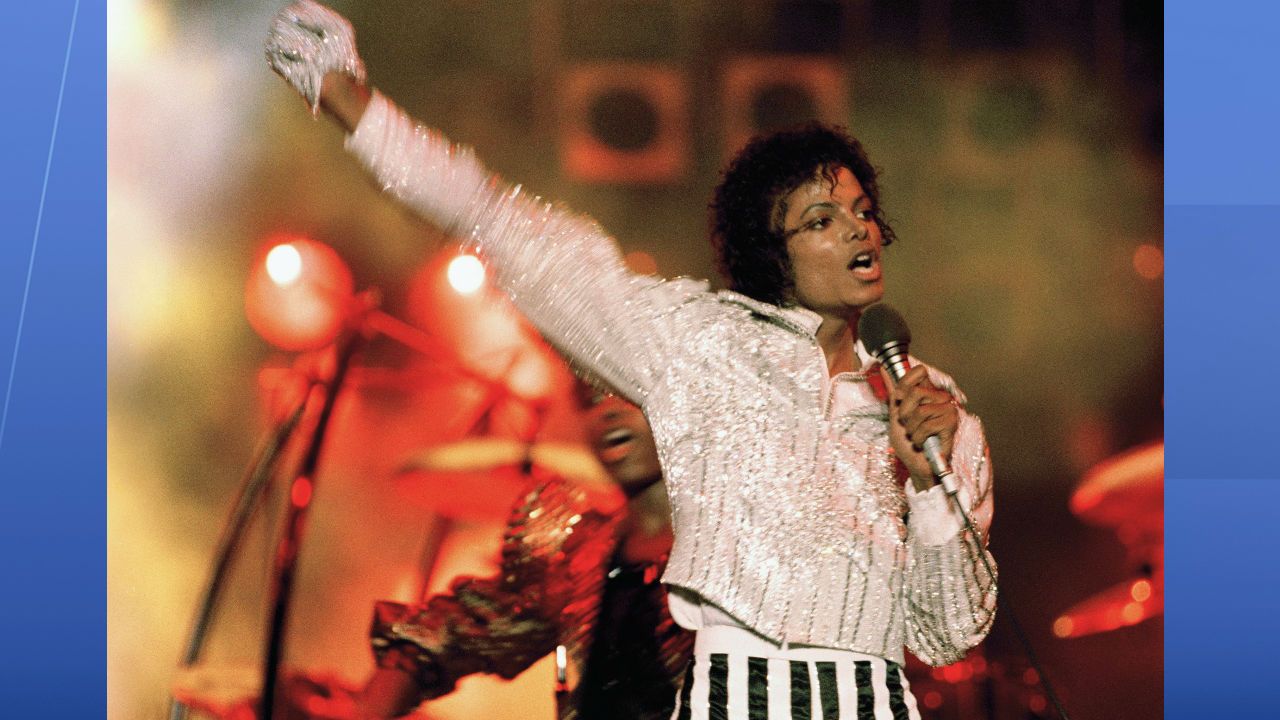 - In this July 1984 file photo, Michael Jackson performs during the "Victory Tour." Julien's Auctions announced on Oct. 13, 2017, that a white glove Jackson wore on his "Triumph" tour is among several Jackson memorabilia items set to go up for bid on Nov. 4. (AP Photo, File)