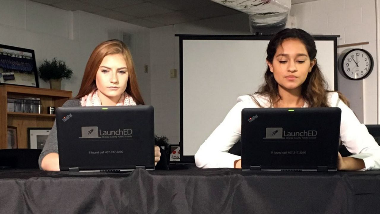 Alyssa Raghu (right), 16, and Jada Simpson (left), 16, both take classes through Orange County Public School’s Virtual School program. (Erin Murray/Spectrum News 13)