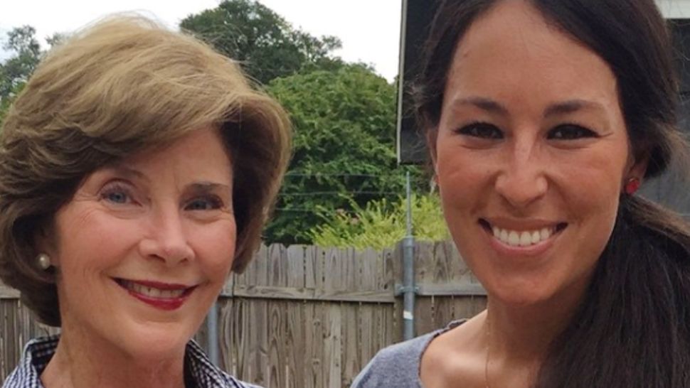 Former first lady Laura Bush poses with "Fixer Upper" host Joanna Gaines. 