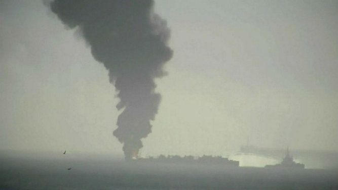 Smoke plume from a fuel barge caught on fire three miles off the Texas coast the morning of Oct. 20, 2017.
