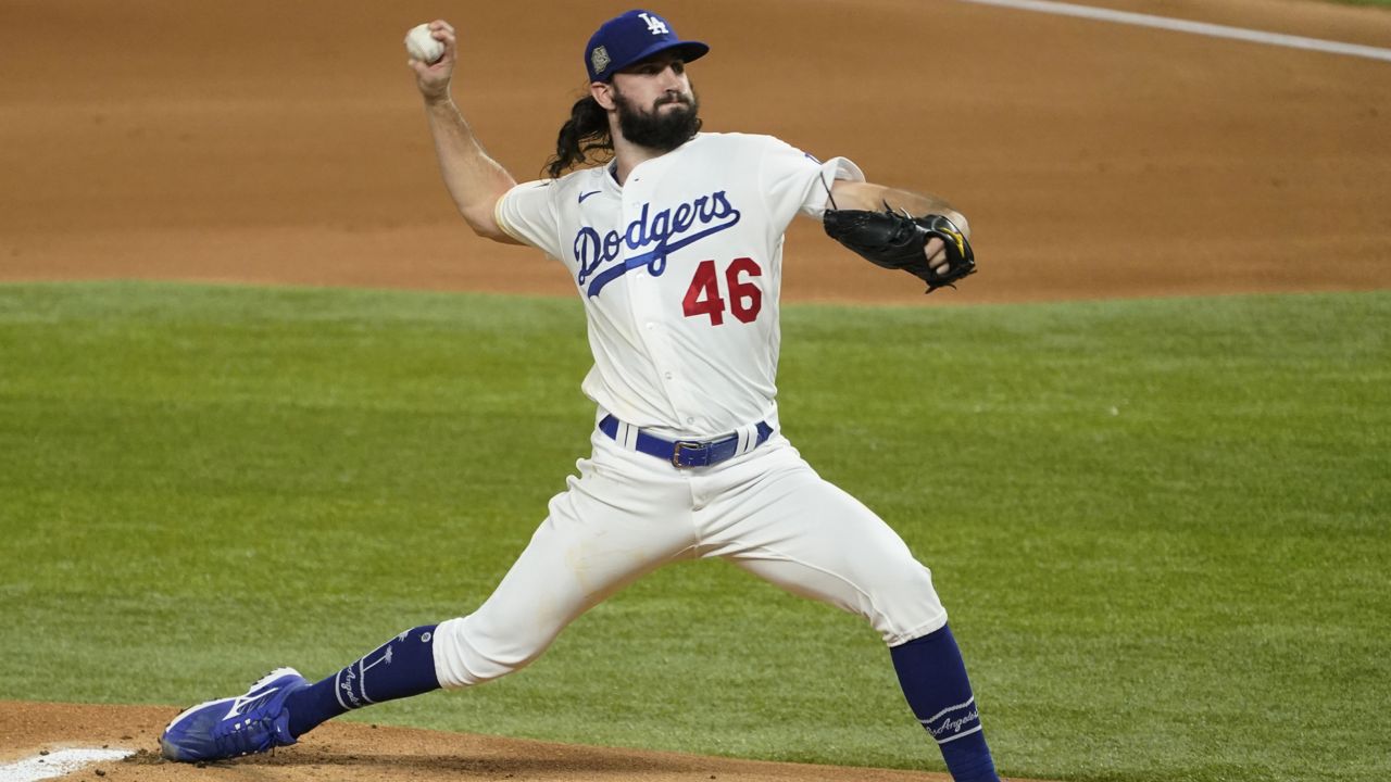 Los Angeles Dodgers starting pitcher Tony Gonsolin throws against the Tampa Bay Rays during the first inning in Game 2 of the World Series Wednesday, Oct. 21, 2020, in Arlington, Texas. (AP Photo/Tony Gutierrez)